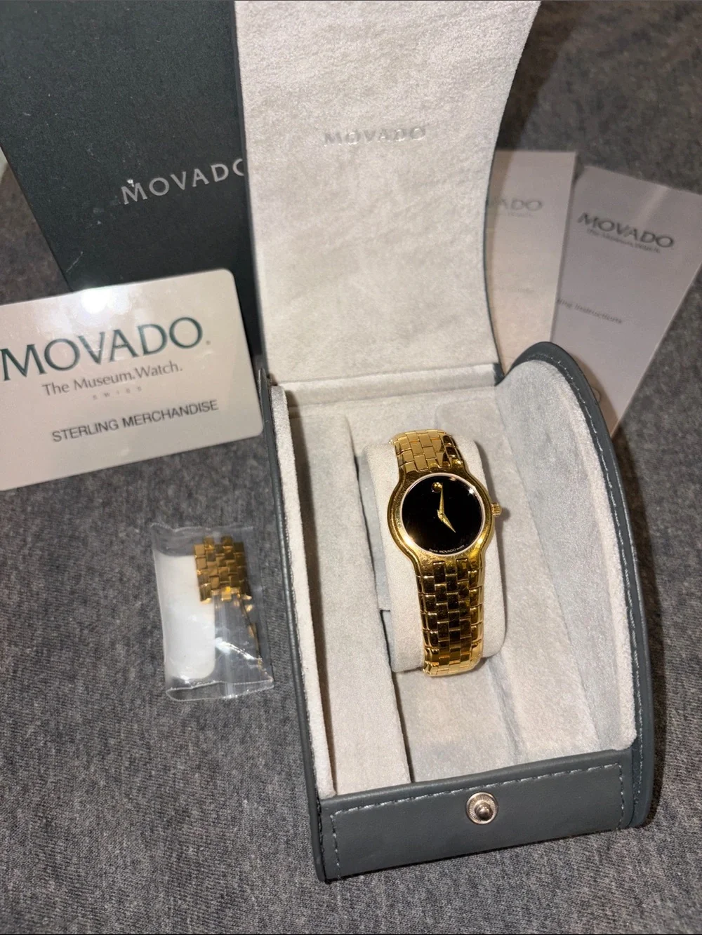Womens Movado designer watch w grey case & box w logo jewelry watches slim band